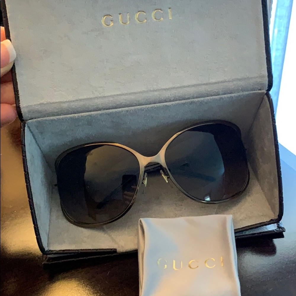 Gucci Sunglasses.   New in Case with cloth.